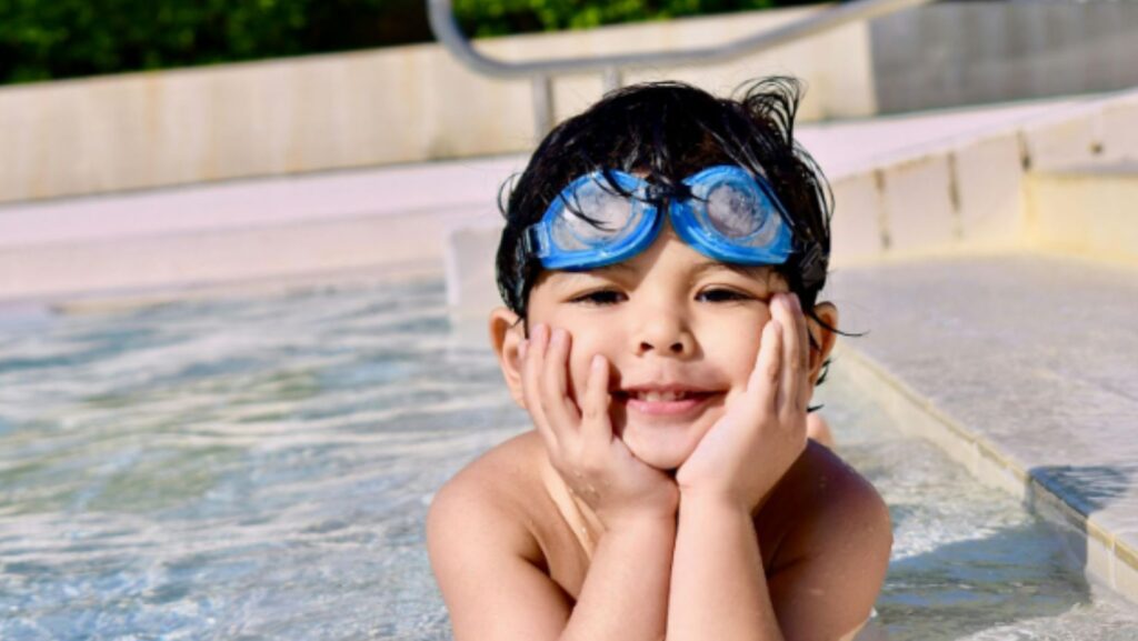 kid on swimming pool